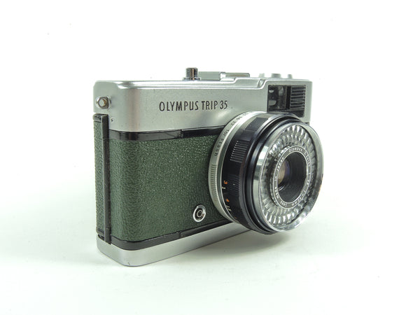 Early Olympus Trip 35 in dark green cowhide leather