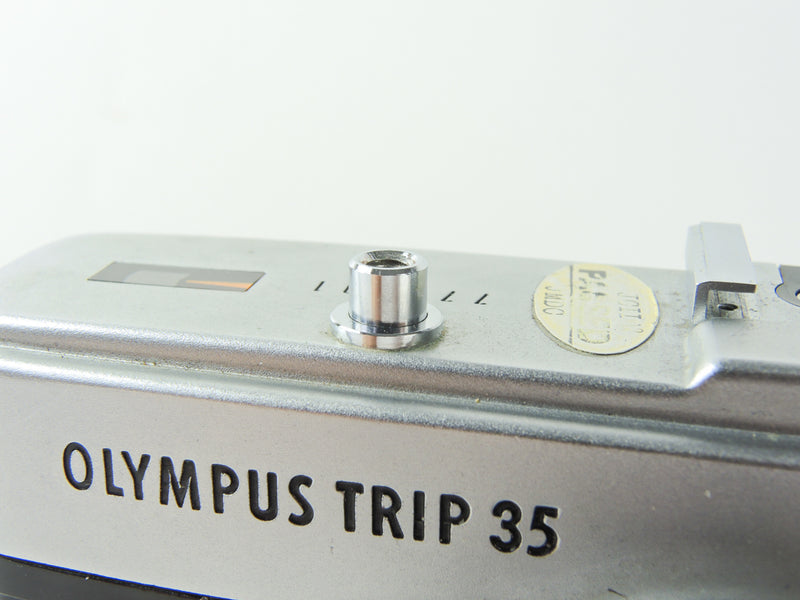 Olympus Trip 35 chrome shutter button - used