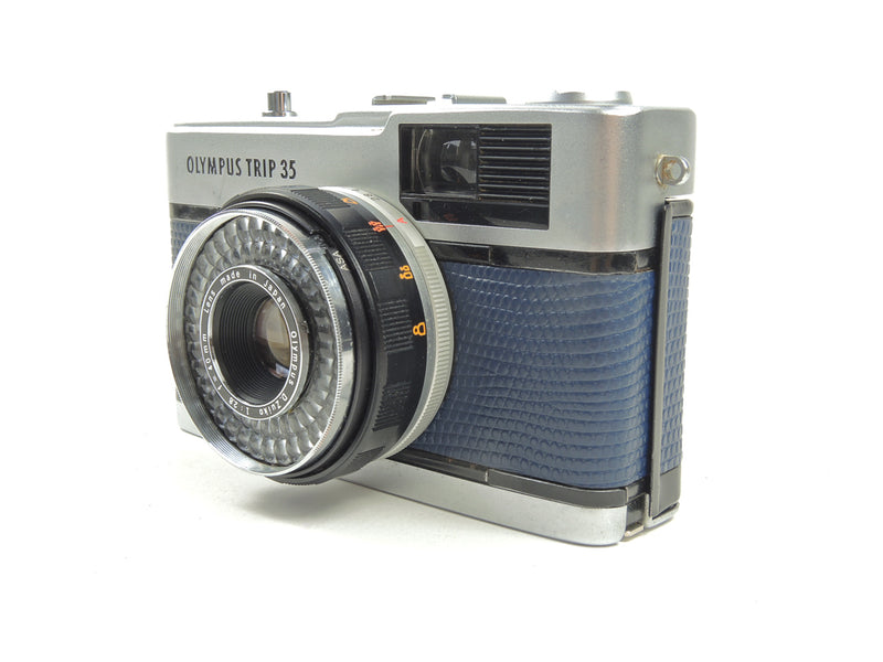 Early Olympus Trip 35 in navy blue lizard cowhide leather