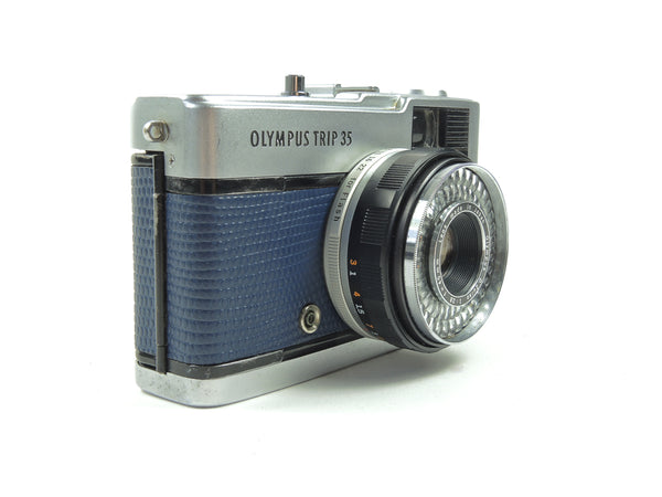 Early Olympus Trip 35 in navy blue lizard cowhide leather